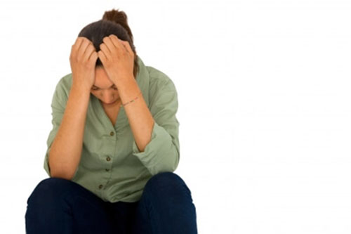 donna-con-la-testa-tra-le-mani Gravidanza ectopica