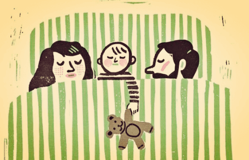 coppia che dorme nel lettone