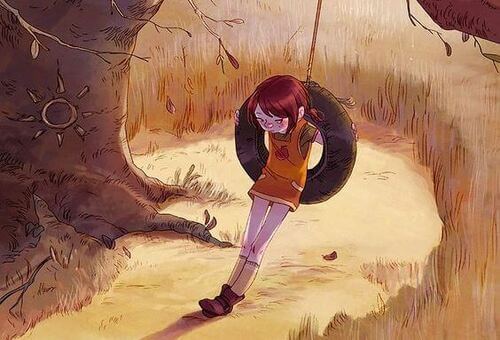 Bambina triste sull'altalena