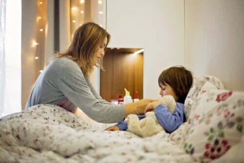 Bambino malato a letto
