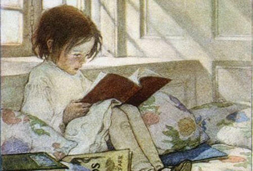 bambina che legge un libro